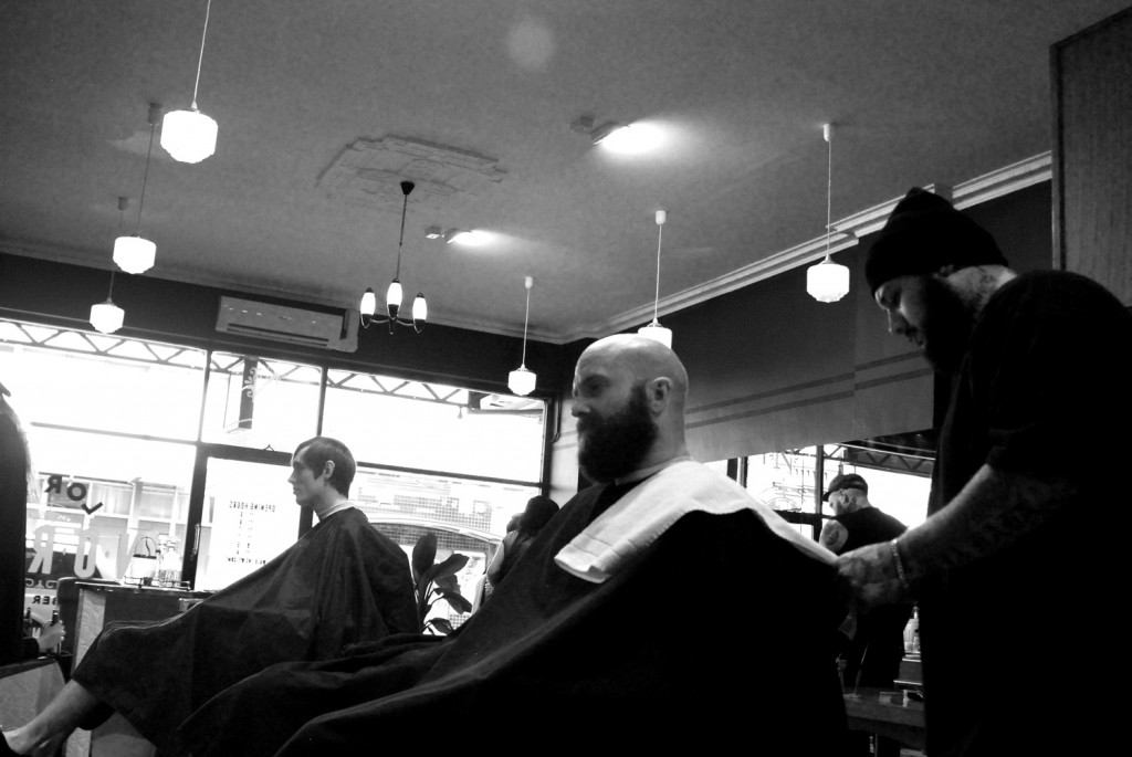 photo by Diane Kitanoski of patrons in barber shop